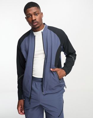 Under Armour co-ord Unstoppable bomber jacket in grey | ASOS