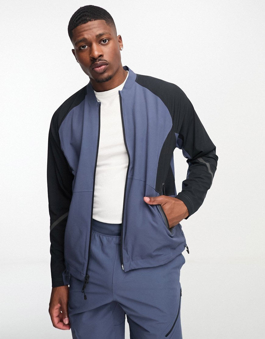 Under Armour co-ord Unstoppable bomber jacket in grey