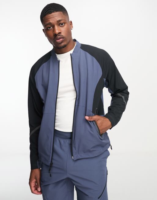 Under Armour co ord Unstoppable bomber jacket in grey ASOS