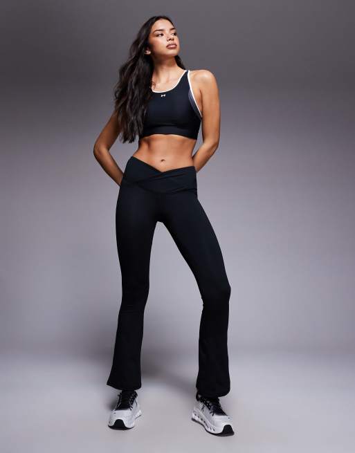 Under Armour crossback open back sports bra in black and white, 2 of 4