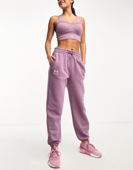 Under Armour MOTION - Tracksuit bottoms - misty purple/fresh