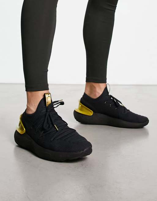 under armour gold and black shoes