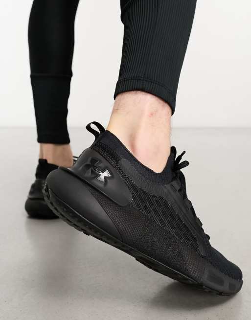 All black store under armour sneakers