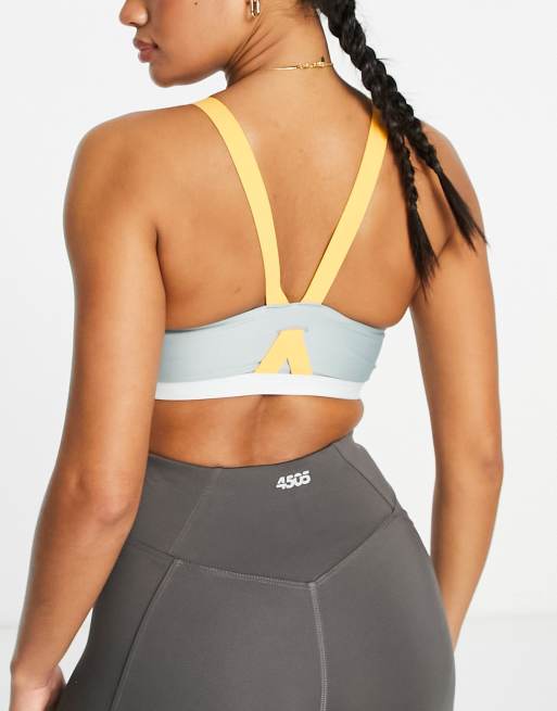 Under Armour Infinity mid support high neck sports bra in grey shine