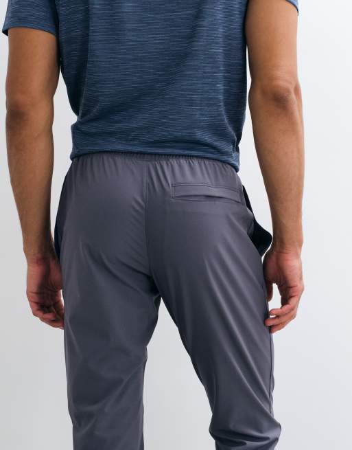 Under Armour joggersy w kolorze szarym, 4 z 5