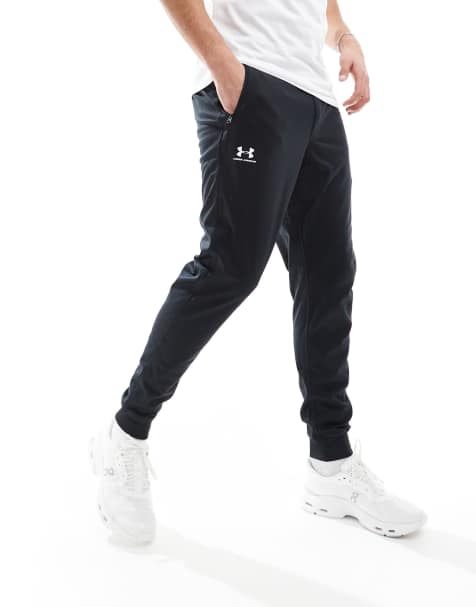 Under Armour – Jogginghose in Schwarz im Sporttrikot-Style - view 1