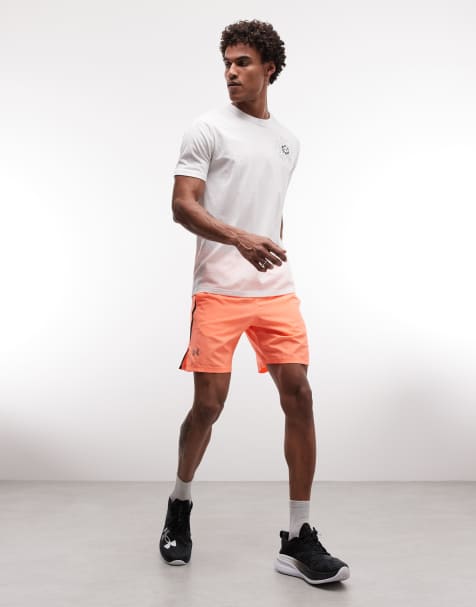 Under Armour Launch 7-inch shorts in electric tangerine - view 1