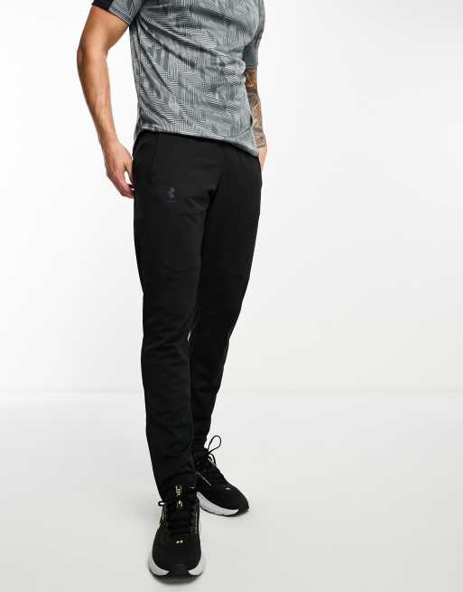 Under Armour Pique track pant in black | ASOS