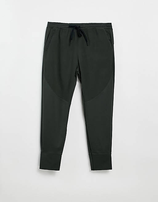 Under Armour recover fleece joggers in green and black