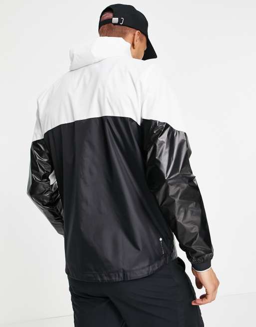 Black and white store under armour windbreaker