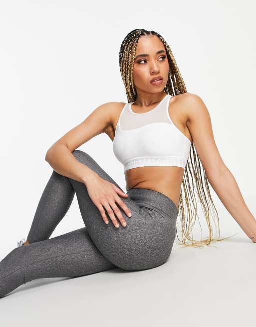 Under Armour - Reggiseno a sostegno medio con incrocio sul retro grigio e bianco