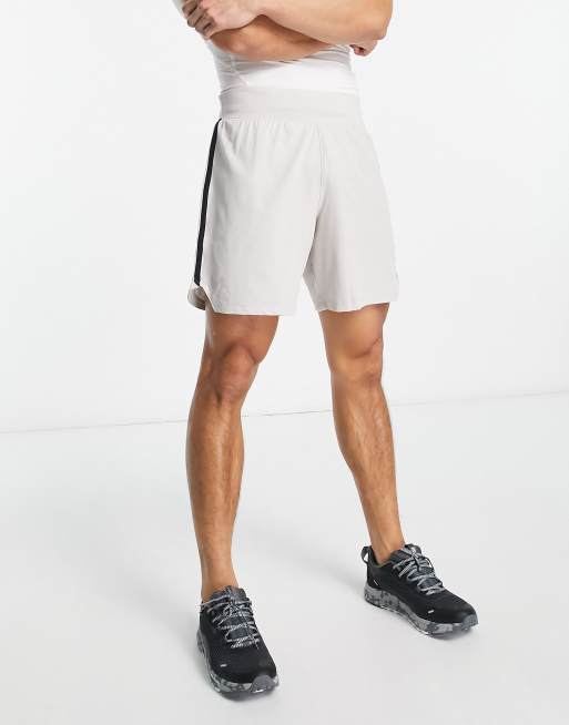 Under Armour Running Speedpocket 7 inch shorts in grey