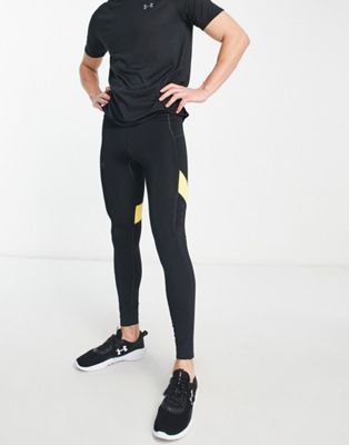 Under Armour Running Speedpocket tights in black and yellow, £42.00