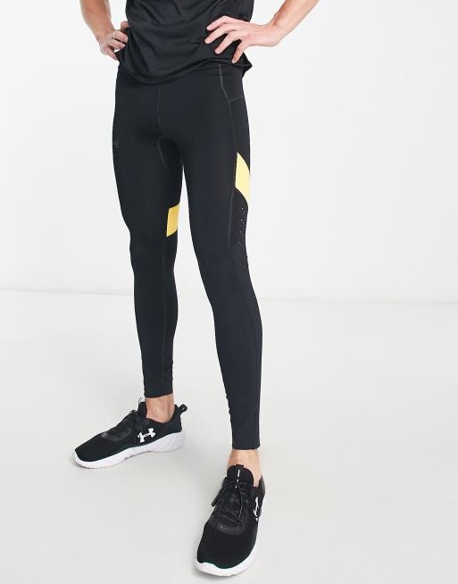 Under Armour Running Speedpocket tights in black and yellow