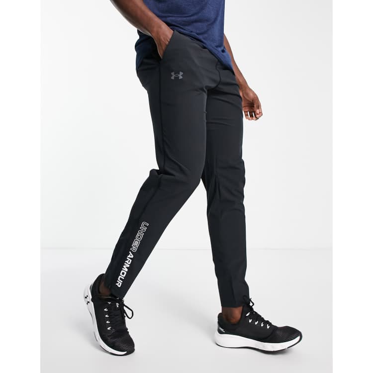 Under armour storm hotsell icon tracksuit bottoms mens