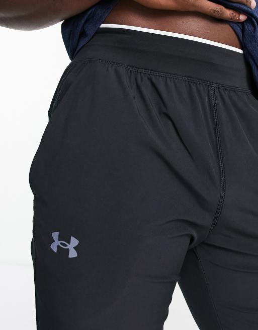 Under Armour Running Storm joggers with side logo in black