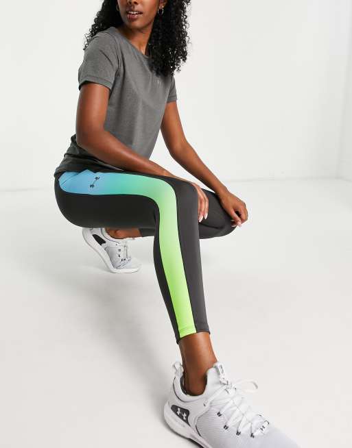 Under Armour Speed Pocket leggings with side fade in black