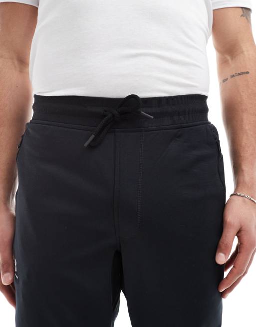 Under Armour sportstyle tricot trackies in black, 5 of 5