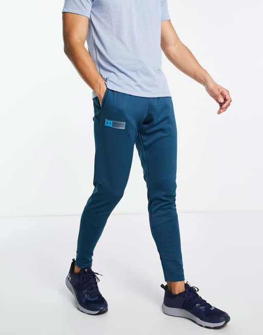 Under Armour – Storm – Jogginghose in Marineblau