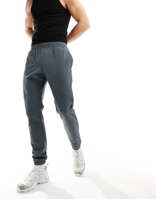 Mens sports pants Under Armour STRETCH WOVEN CARGO PANTS grey