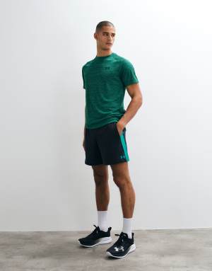 Under Armour Tech Vent 7in Jacquard Shorts in Ultimate black and green