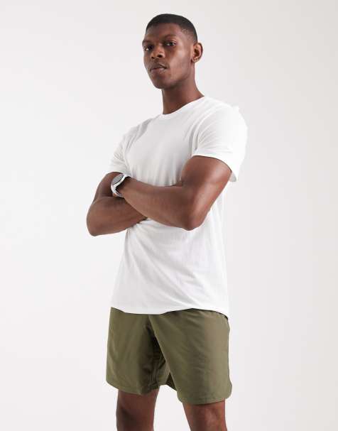 Under Armour Tech woven wordmark shorts in marine green - view 1