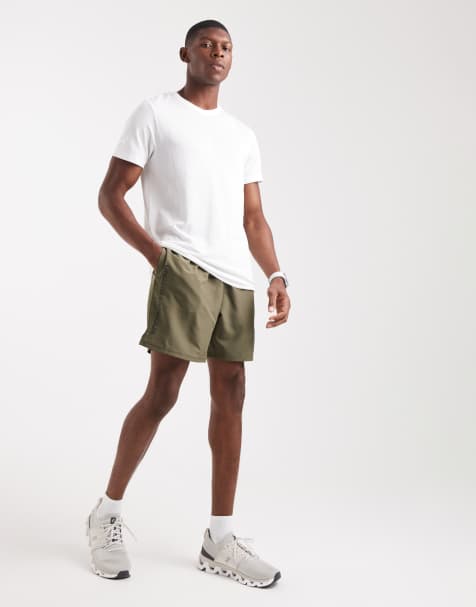 Under Armour Tech woven wordmark shorts in marine green