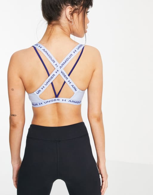 Under Armour Training – Bladoniebieski biustonosz sportowy ze średnim wsparciem i skrzyżowanymi ramiączkami z tyłu