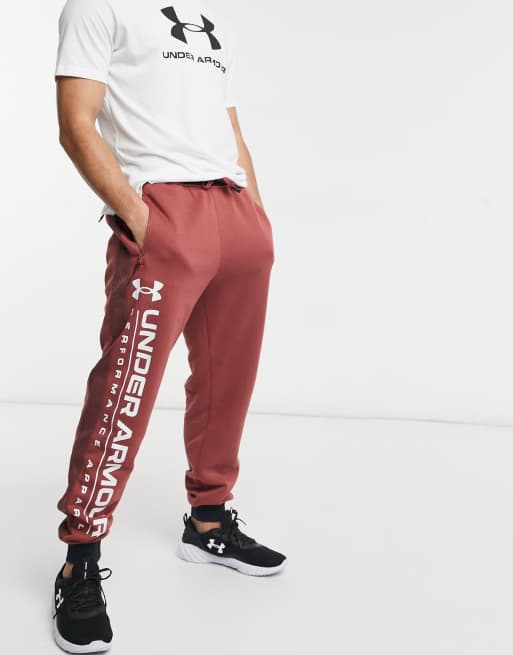 Under Armour Training Charged fleece joggers with logo in red ASOS