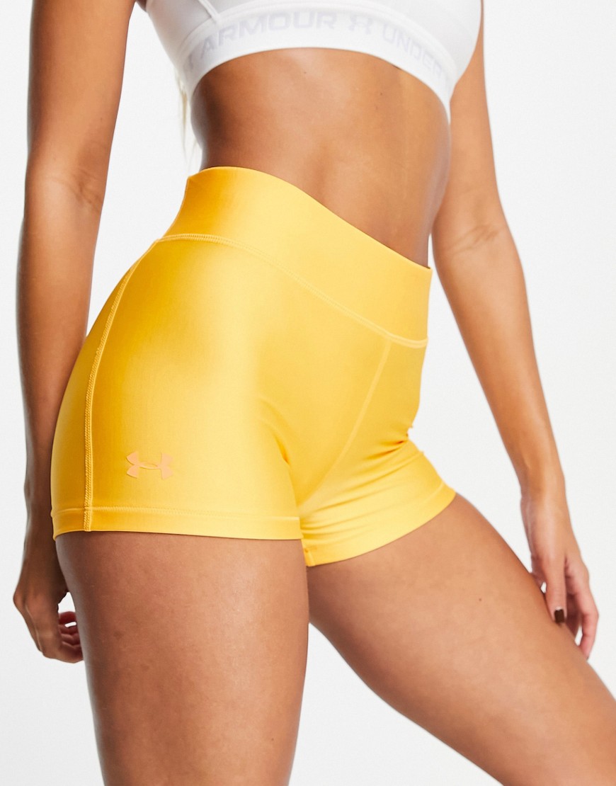 Under Armour Training mid rise booty shorts in orange