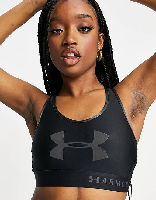 Under Armour Training mid support graphic keyhole sports bra in black | ASOS