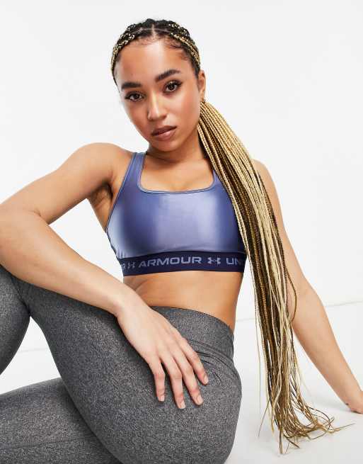 Under Armour Training – Niebieski biustonosz sportowy ze średnim wsparciem, skrzyżowanymi ramiączkami z tyłu i połyskliwym wykończeniem