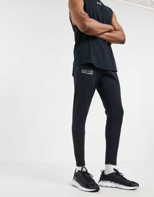 Under armour storm outlet joggers black