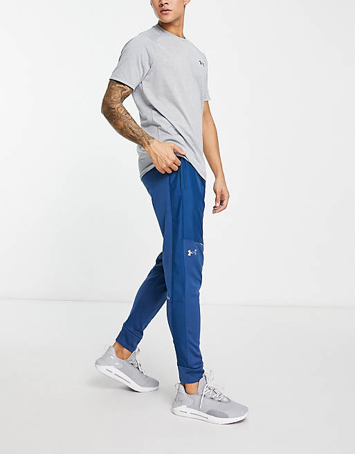 Under Armour Training Storm winterized joggers in blue | ASOS