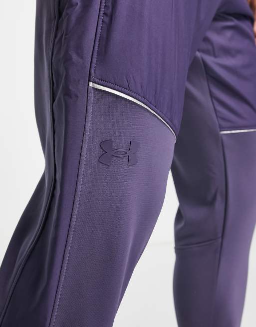 Under armour storm 2024 pants purple men