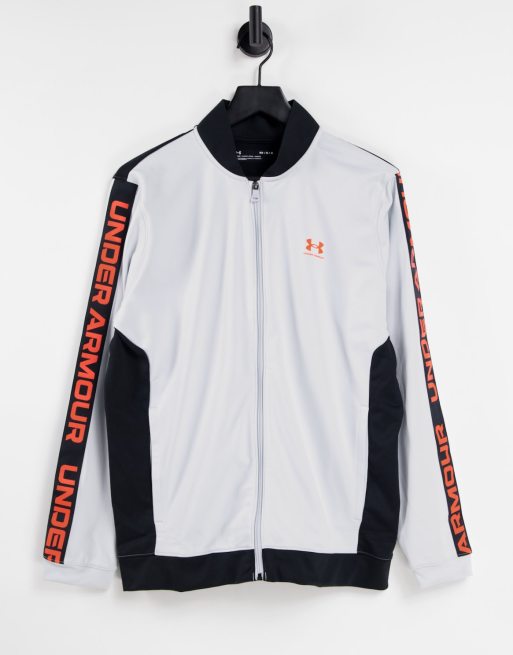 Under Armour - Tricot trainingsjack met bies in grijs