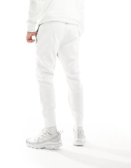 Under Armour Unstoppable colourblock fleece joggers in grey and white