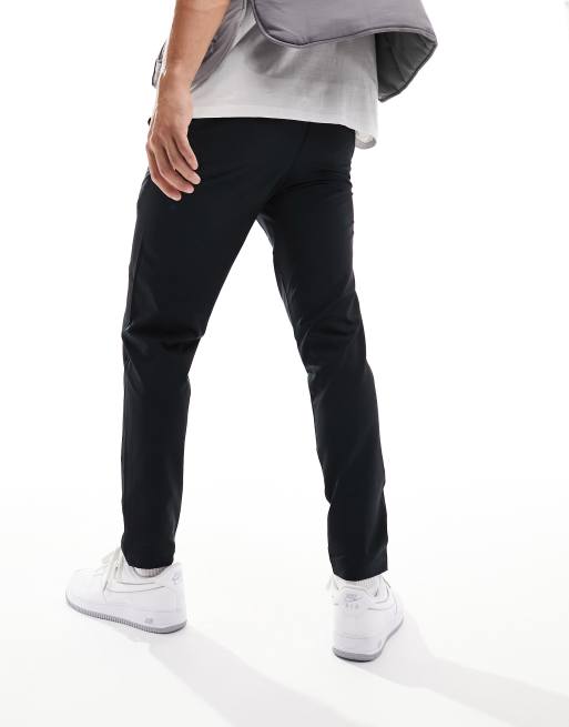 Under Armour UNSTOPPABLE TAPERED - Tracksuit bottoms - black