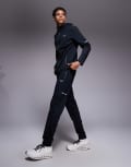 [Under Armour] Under Armour utility woven trackies in black XL BLACK