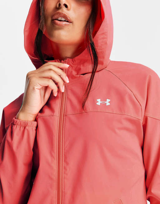 Under Armour woven hooded jacket in pink