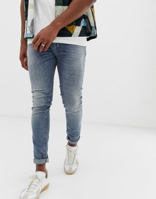 United Colors Of Benetton - Skinny jeans met scheur en herstelwerk in midwash-Blauw