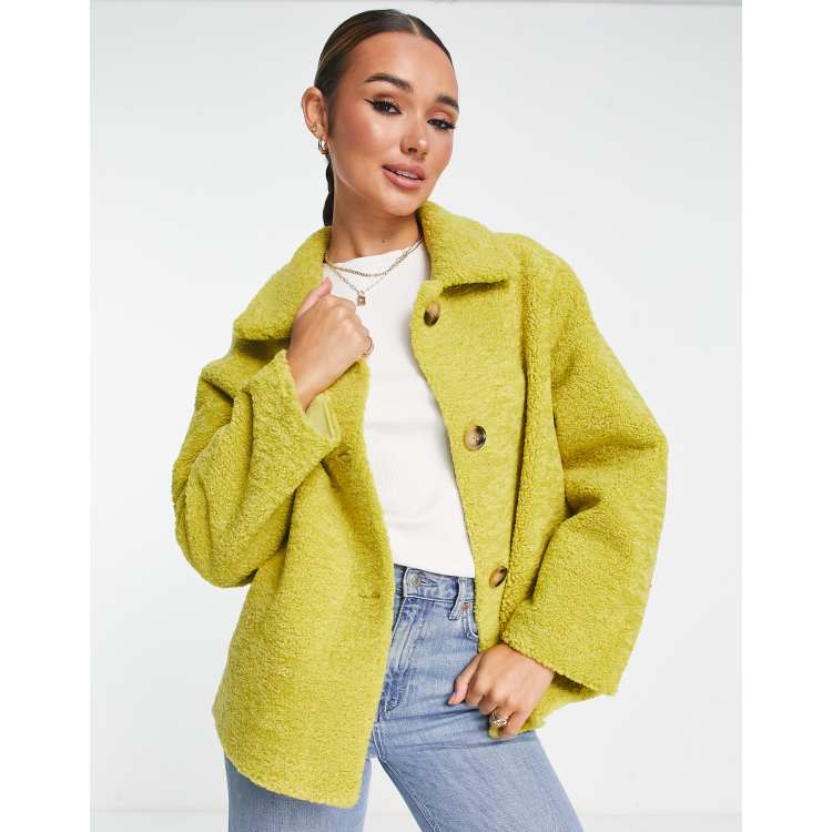 Unreal Fur – Seashell – Teddy-Jacke in Gelb mit Knopfleiste ASOS