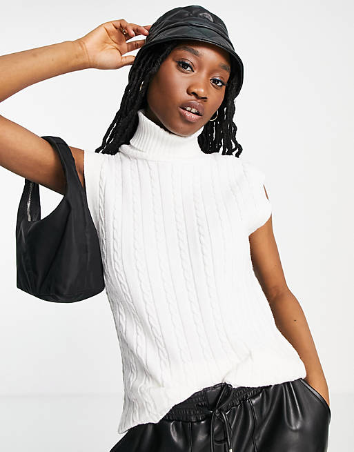 Urban Bliss high neck cable knit sleeveless sweater in cream | ASOS