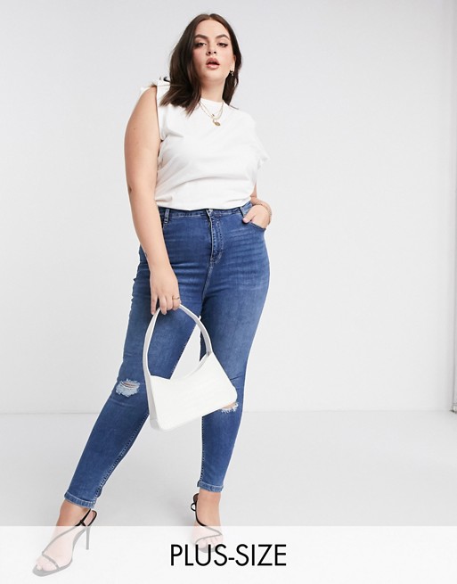 Urban Bliss Plus high waisted skinny jean with knee rips in mid wash