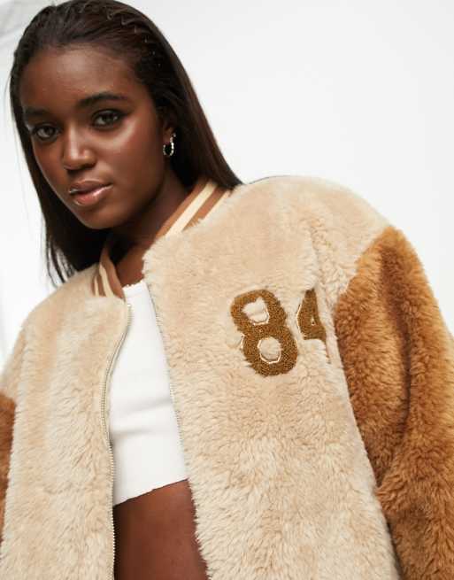 Urban Code oversized teddy varsity jacket in brown | ASOS