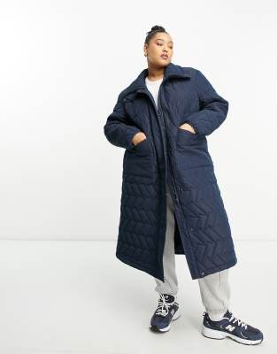 Urbancode Curve Urban Code Plus longline puffer coat with zigzag quilt in navy