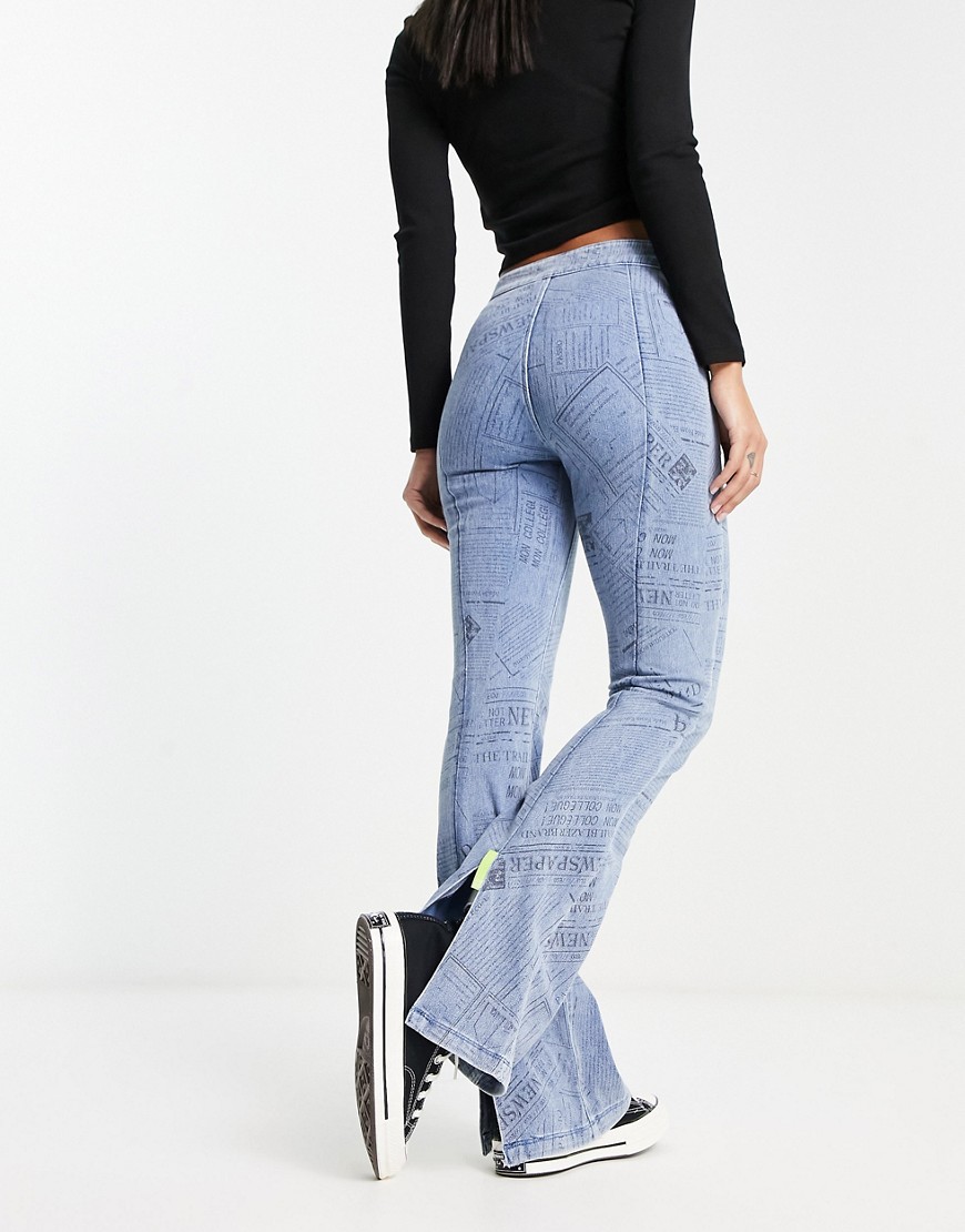 Urban Revivo bootcut flare denim jeans with graphic detailing in blue