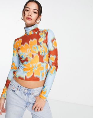 Urban Revivo cropped tee with flower graphic in multi