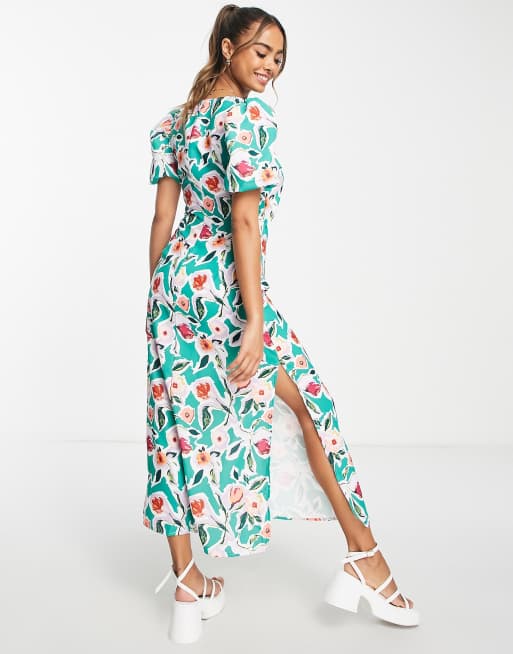 Urban Revivo cut out front midi dress in green print | ASOS