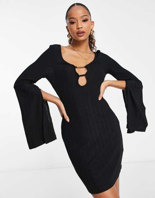 Black cocktail dress store with bell sleeves